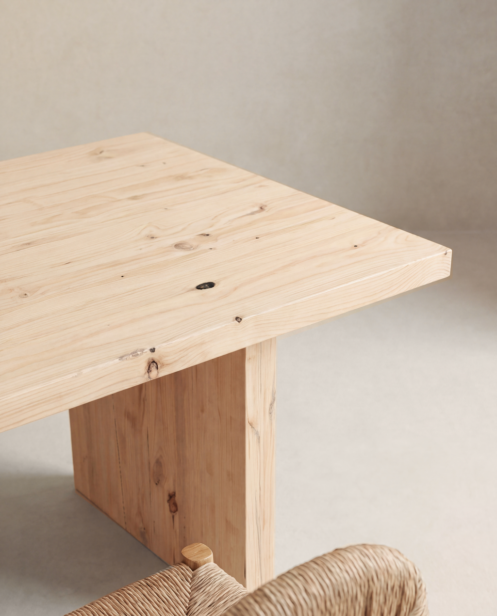 Byron Dining Table — tabletop corner and panel leg