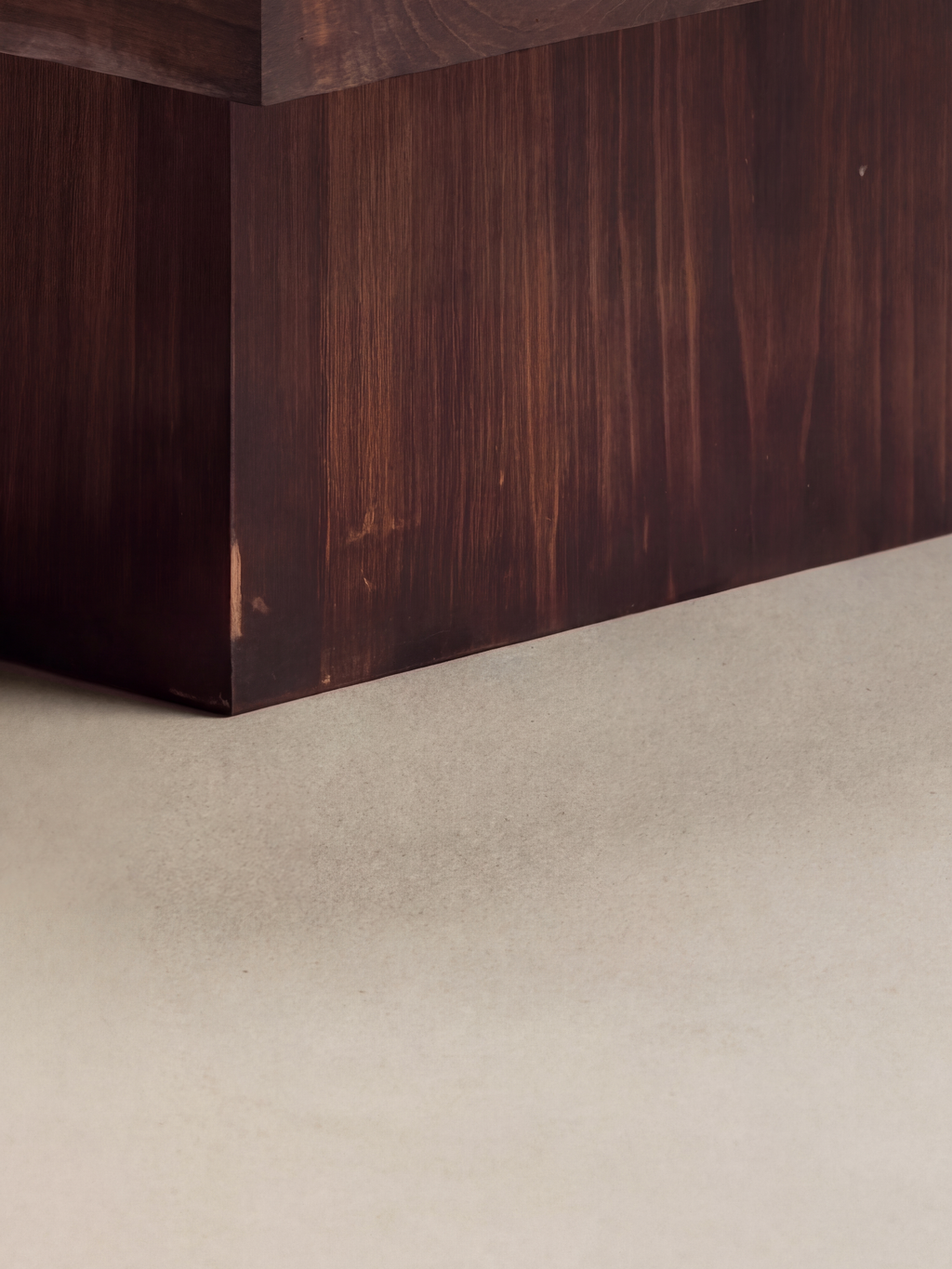 Square Base Coffee Table — plinth corner and finish