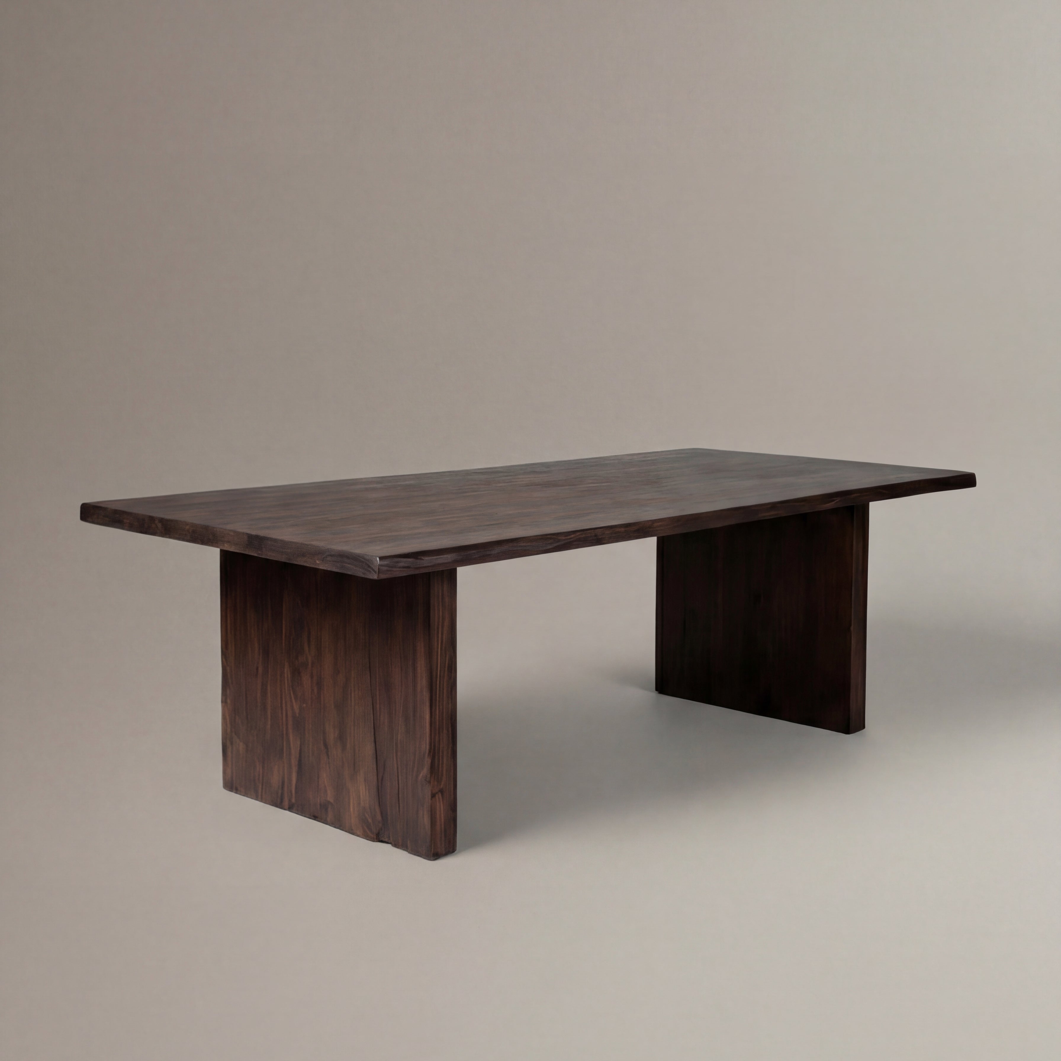 Dark wooden table on a plain background