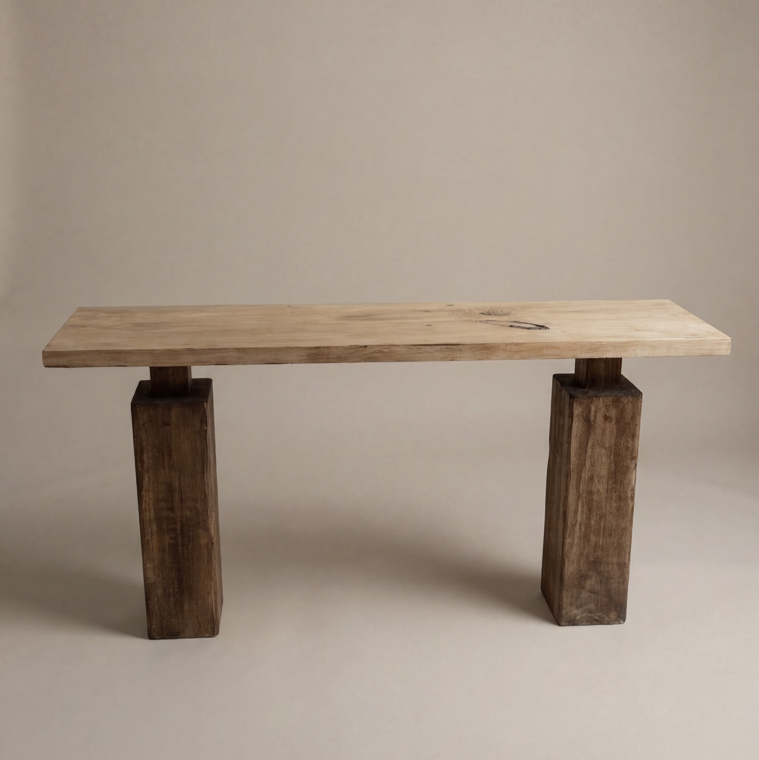 Wooden bench with rustic legs on a plain background